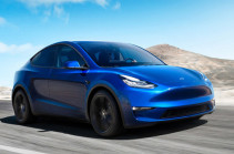 Musk adds new Model Y to electric car line-up (video)