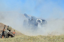 Azeri forces pushed back in eastern direction leaving vehicles and manpower