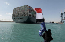 Suez Canal: Ships begin sailing through cleared waterway