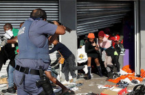 South Africa Zuma riots: Death toll mounts amid looting