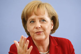 Greece welcomes Merkel, Sarkozy plan