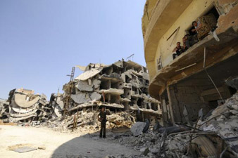 Documented death toll in Syria war at least 191,369 through April 2014 