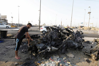 Car bombing kills at least 11 people in Baghdad