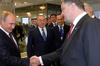 Первая встреча Путина и Порошенко продолжалась около двух часов
