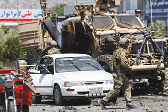 Afghan conflict: Convoy hit in Kabul bomb attack
