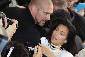 Kim Kardashian gets attacked by Ukrainian red carpet prankster