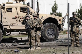 New Afghan government to sign US troop deal