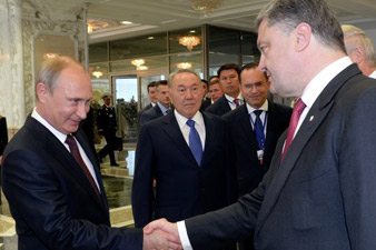 В Милане началась двусторонняя встреча Путина и Порошенко