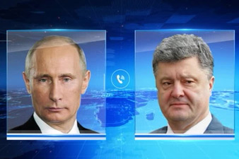Порошенко обсудил с Путиным прекращение огня на Донбассе