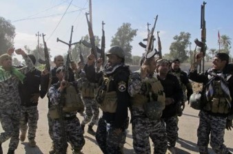Islamic State fighters battle Iraqi forces near Baiji refinery