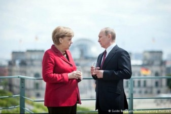 EU will hit Russia with tougher sanctions if Ukraine truce fails, Merkel says