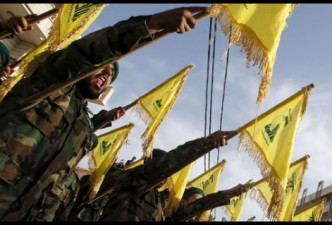 Hezbollah widens offensive in Syria border area, seizes hilltops