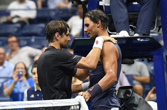 Rafael Nadal reaches US Open second round after David Ferrer retires hurt in his final Grand Slam appearance