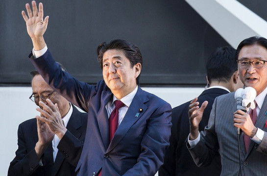 Shinzo Abe re-elected as head of ruling party in Japan
