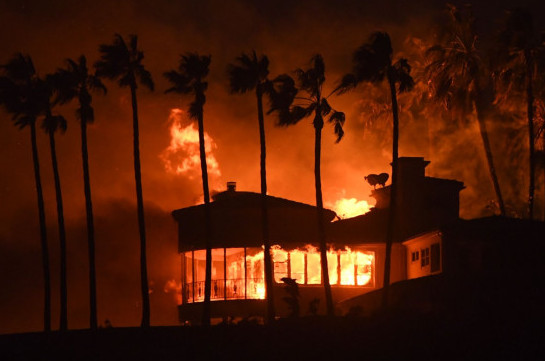 California wildfires: Malibu homes burn as death toll climbs to nine