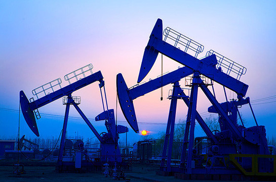 Oil slips back toward 18-month lows on oversupply