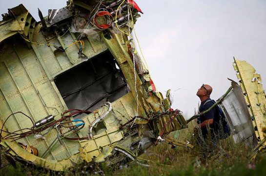 Four charged with shooting down MH17 plane
