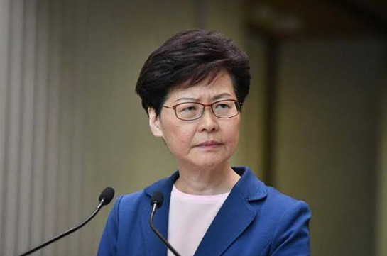 Hong Kong leader warns protesters not to push city into 'abyss'