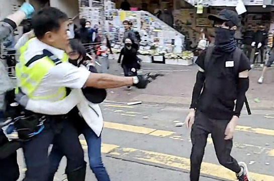 Hong Kong police shoot man in Monday morning rush hour protests