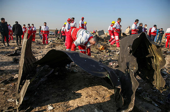 Iran investigation says airliner caught fire before crash, Ukraine outlines theories