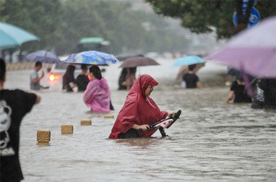 12 dead and thousands evacuated in China floods